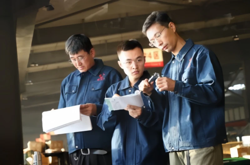 Company employees focus on research and discussion work