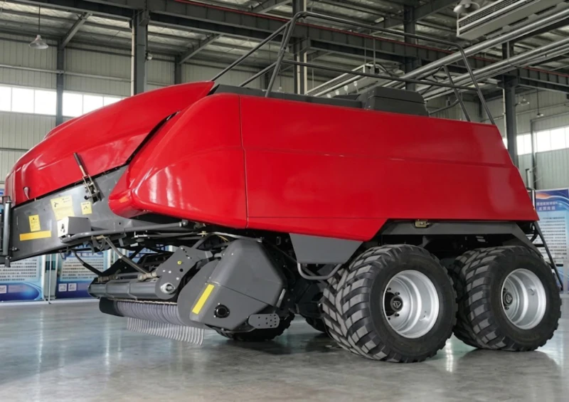 EP-9YFQ-2290XD Large Square Baler detail view — fork feeding mechanism, dual-axle undercarriage and rear bale discharge system